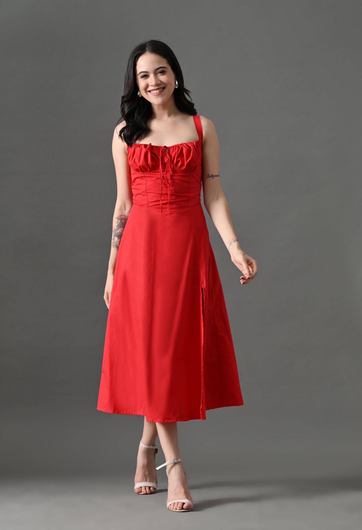 "Red corset midi dress with sweetheart neckline, thigh-high slit, and flowy skirt – perfect for date nights.