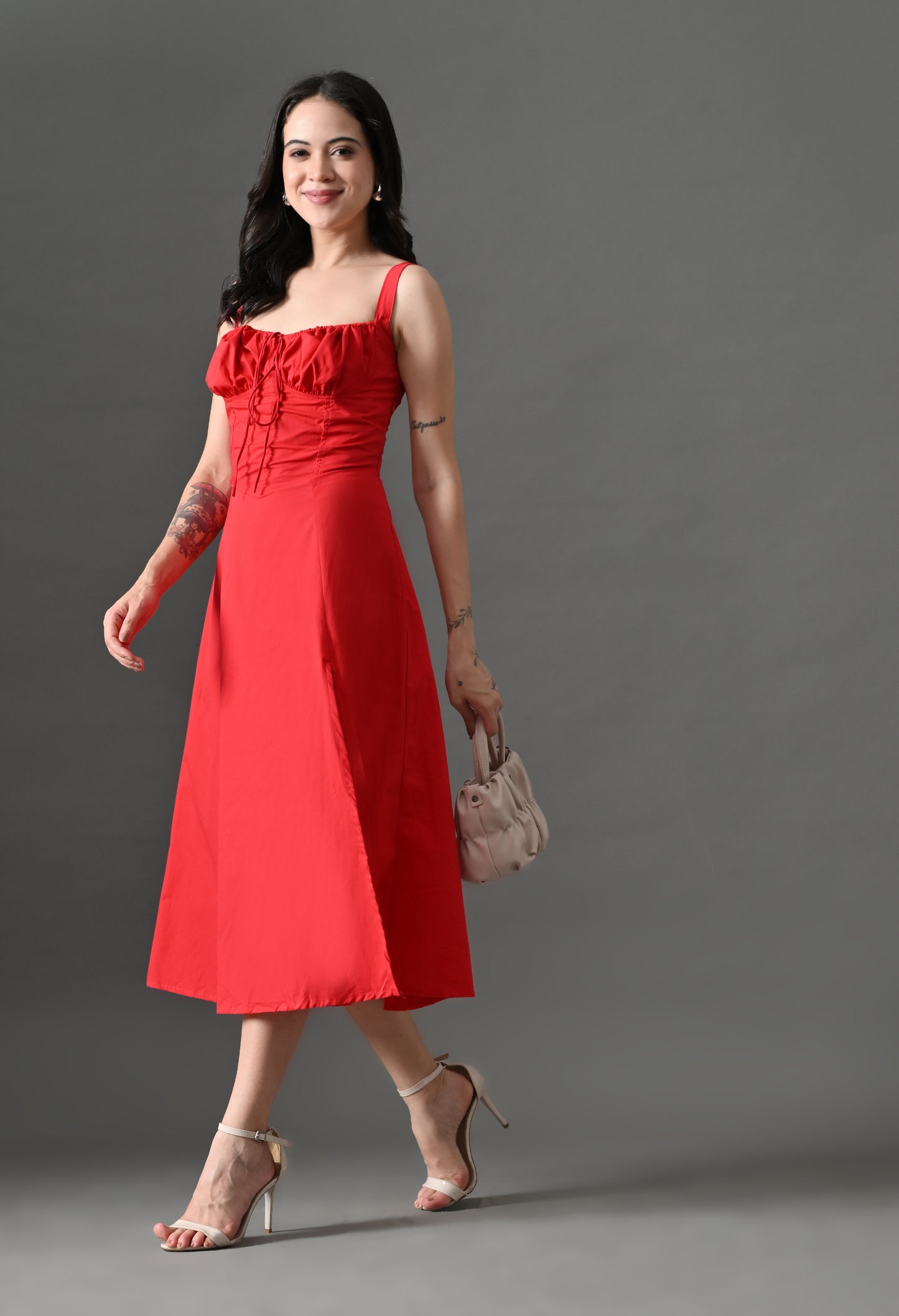 "Red corset midi dress with sweetheart neckline, thigh-high slit, and flowy skirt – perfect for date nights.