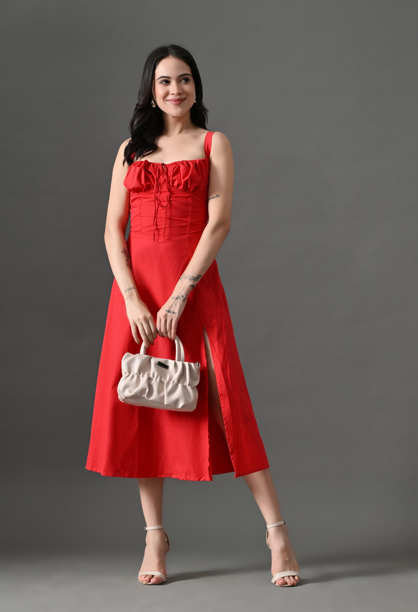 "Red corset midi dress with sweetheart neckline, thigh-high slit, and flowy skirt – perfect for date nights.